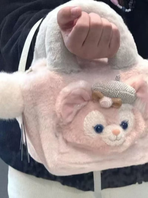 Pluštasta torbica za kameru, bucket bag stil, gradski minimalistički dizajn, proljeće 2025, pogodna za svakodnevnu upotrebu