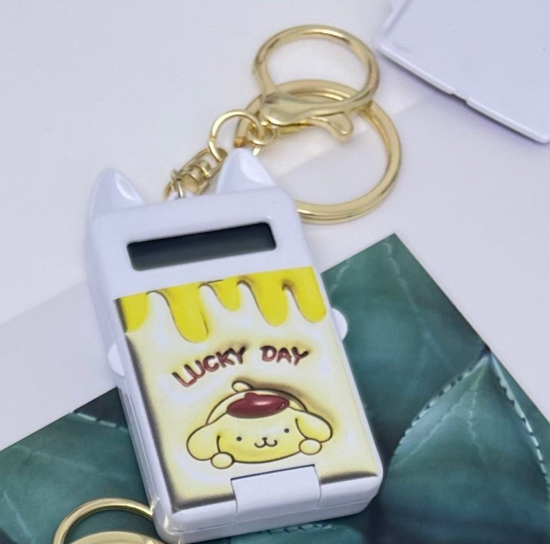 Mini számológép kulcstartó, 8 számjegyű kijelző, ABS műanyag, beépített elem, kompatibilis gombos elemmel