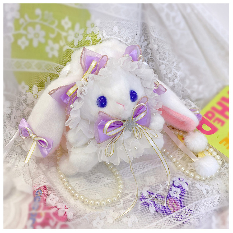 Nyuszi plüss táska masnival és nagy fülekkel (töltet: PP pamut; plüss: szuper puha rövid plüss; állat: nyuszi; 7-14 éveseknek)