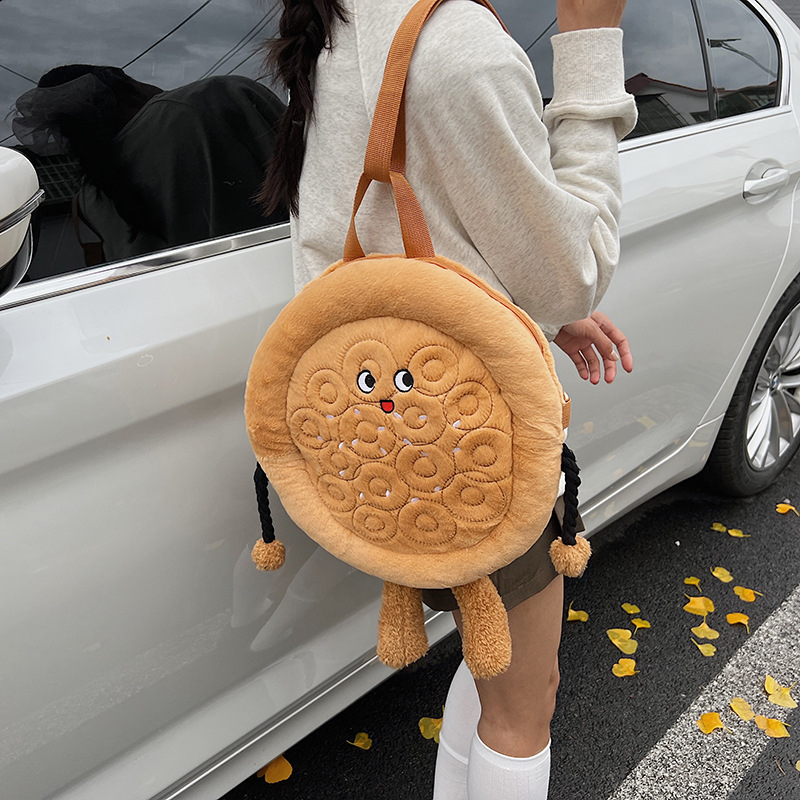 KS plüss naan táska — kör alakú keresztpántos táska cipzárral, belső cipzáras zseb, poliészter bélés