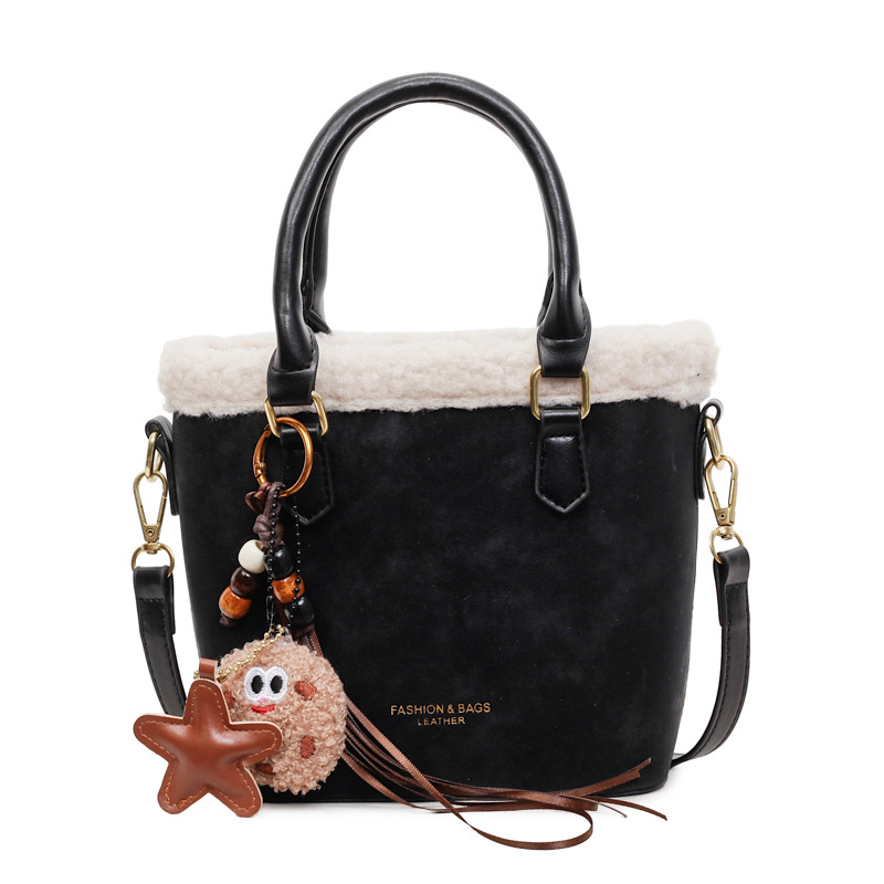 Crossbody torba od PU, oblik kante, zatvaranje na zip, jedna naramenica