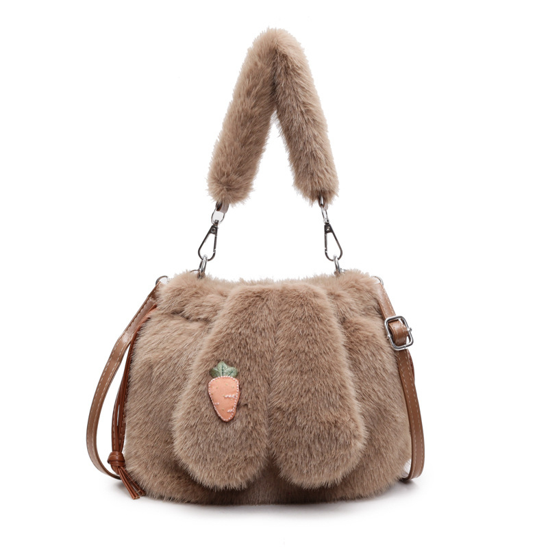 Plüss anyagú bucket táska nyuszifül dizájnnal, húzózáras zárás, belső cipzáras zseb és telefon zseb