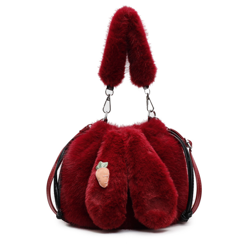 Plüss anyagú bucket táska nyuszifül dizájnnal, húzózáras zárás, belső cipzáras zseb és telefon zseb