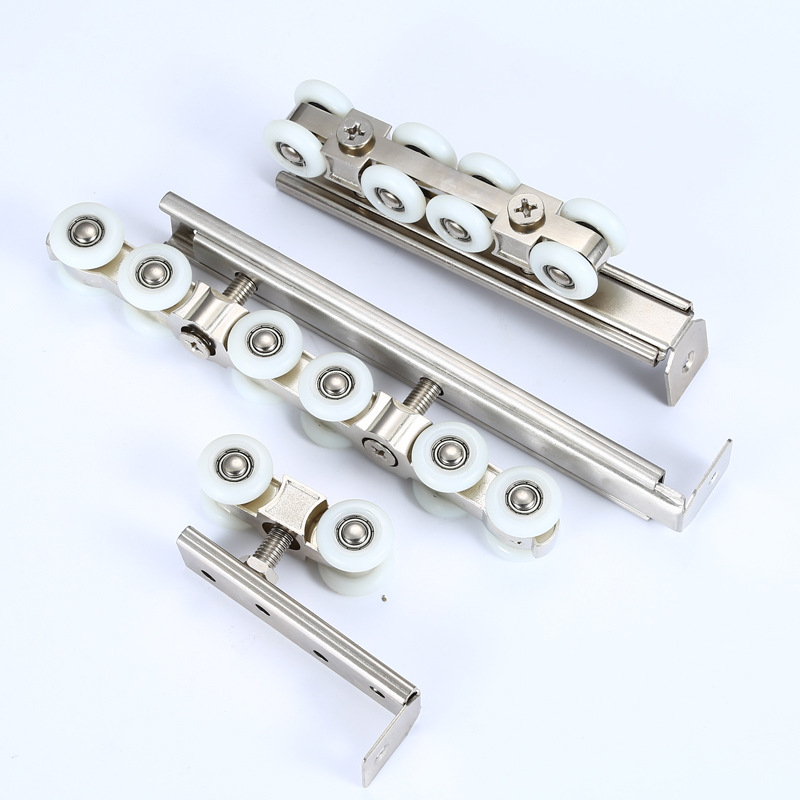 Rulment pentru ușă glisantă interioară, material: oțel inoxidabil / aliaj zincat, diametru exterior 22 mm, diametru ax 20 mm, rază a canelurii pentru frânghie 10.5 mm, sarcină maximă 10 kg pe roată, variante 4/6/8/12 role