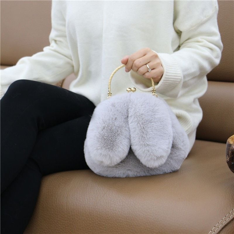 Geantă din blană de iepure artificială, cu urechi de iepure, formă ovală, închidere cu clips, căptușeală din piele sintetică, buzunar pentru telefon