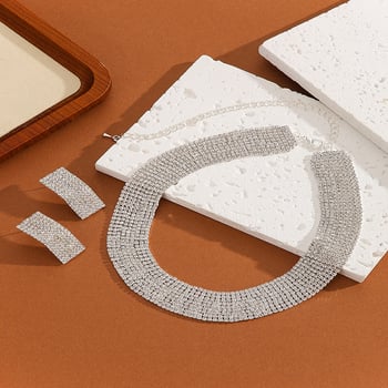 Set od dva dijela: ogrlica i naušnice, srebreni premaz, rhinestone privjesak, geometrijski oblik, opseg 41–50 cm, etno retro stil