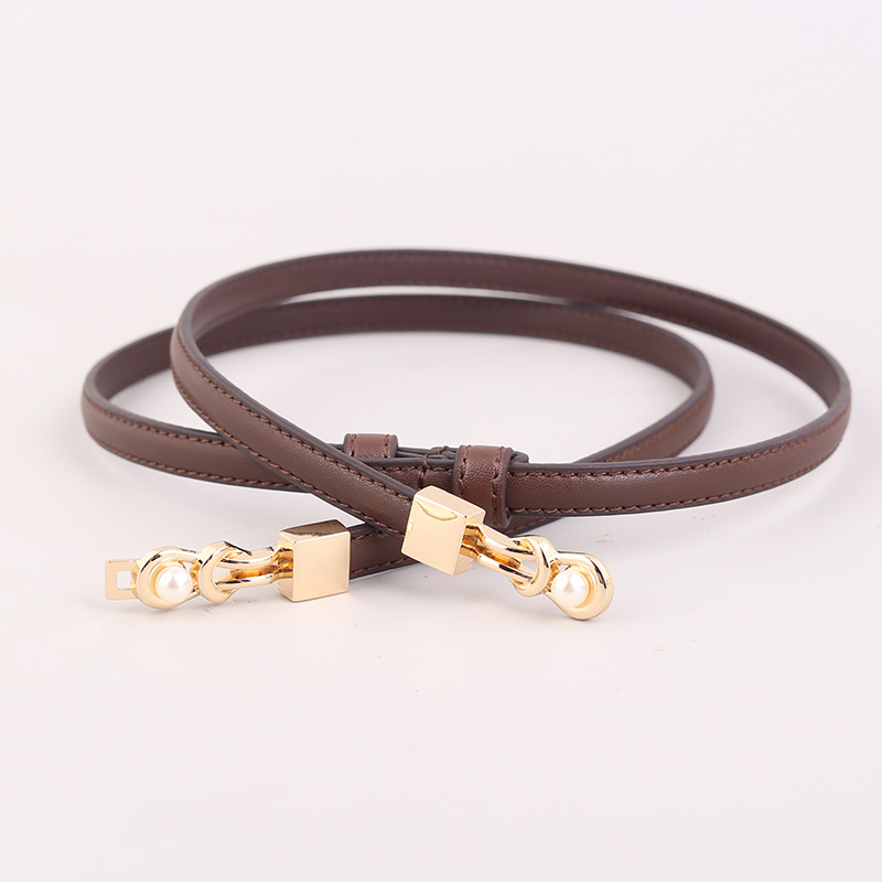 Női vékony valódi bőrből készült öv ötvözet csattal, kampózár, szélesség 2 cm alatt, gyémánt-díszítéssel