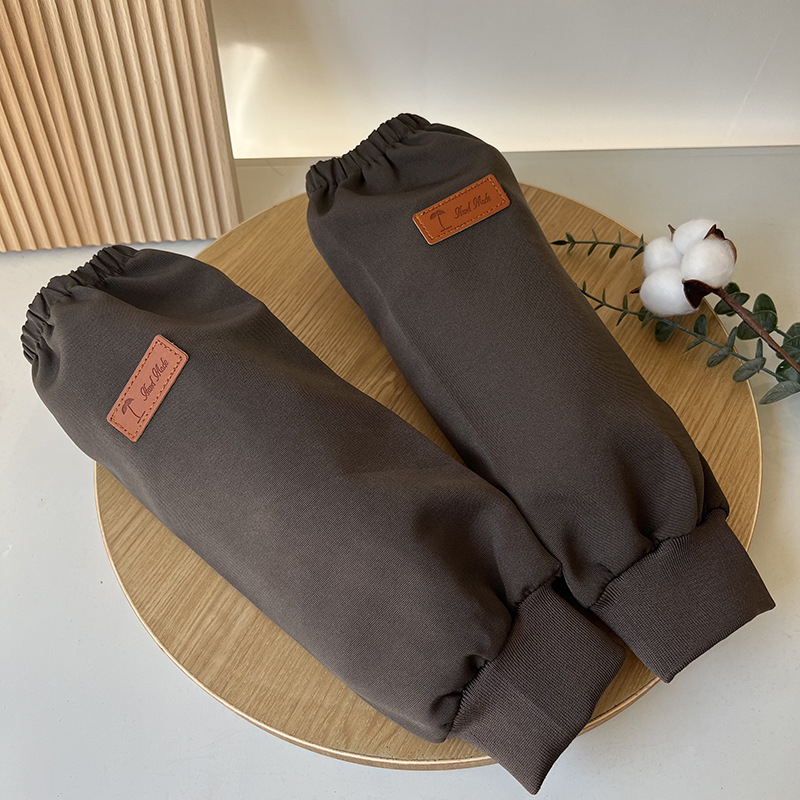 Ujjakkal ellátott vízálló kötény, poliészter, univerzális szabás, egyszínű minta