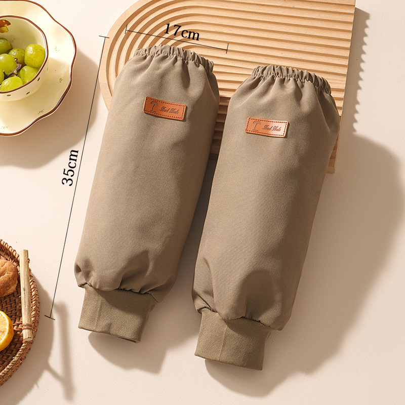 Ujjakkal ellátott vízálló kötény, poliészter, univerzális szabás, egyszínű minta