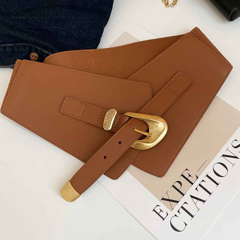 Centură elastică din piele sintetică, design minimalist, lățime peste 4 cm, cataramă din aliaj, realizată manual.