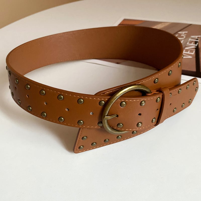 Centură elastică din piele sintetică, design minimalist, lățime peste 4 cm, cataramă din aliaj, realizată manual.