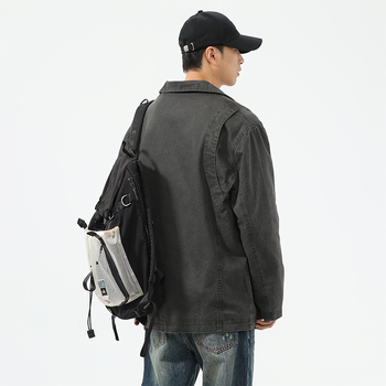 Muško pamučno casual jakna sa stojećim ovratnikom, jednokopčana, uskog kroja, debeli materijal, dekorativne džepove