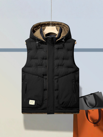 Muška debela vest s odvojivom kapuljom, prednji zatvarač, slobodan kroj, vanjski materijal 100% poliester, podstava poliester, zimska izolacija