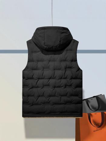 Muška debela vest s odvojivom kapuljom, prednji zatvarač, slobodan kroj, vanjski materijal 100% poliester, podstava poliester, zimska izolacija