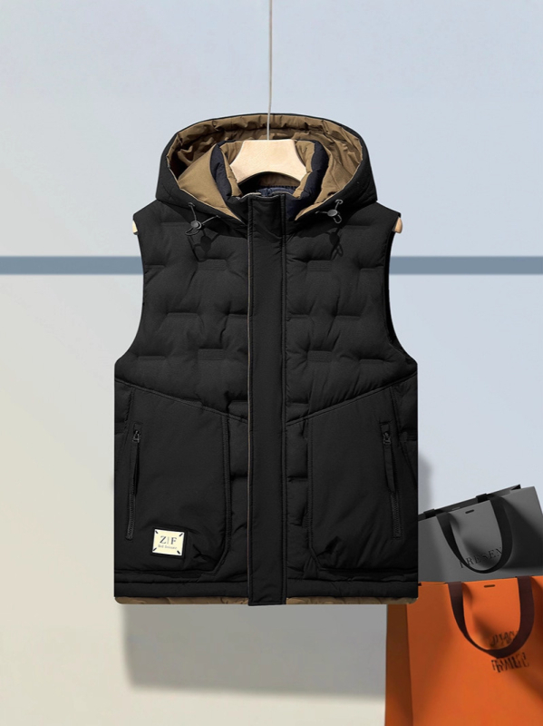 Muška debela vest s odvojivom kapuljom, prednji zatvarač, slobodan kroj, vanjski materijal 100% poliester, podstava poliester, zimska izolacija