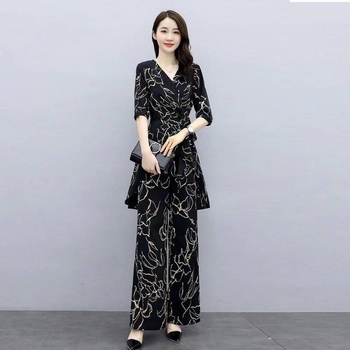 Elegantni ljetni dvodjelni set za plus veličinu: široke hlače i šifon bluza, moderan stil