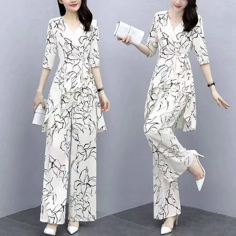Elegantni ljetni dvodjelni set za plus veličinu: široke hlače i šifon bluza, moderan stil