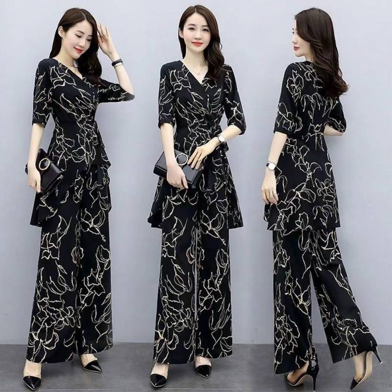 Elegantni ljetni dvodjelni set za plus veličinu: široke hlače i šifon bluza, moderan stil