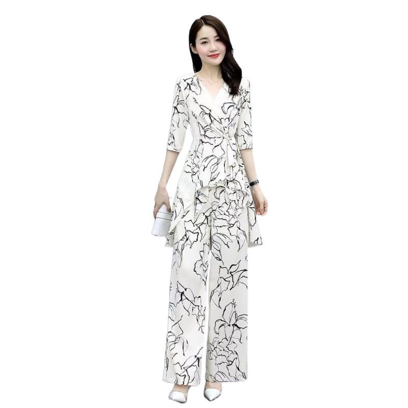 Elegantni ljetni dvodjelni set za plus veličinu: široke hlače i šifon bluza, moderan stil
