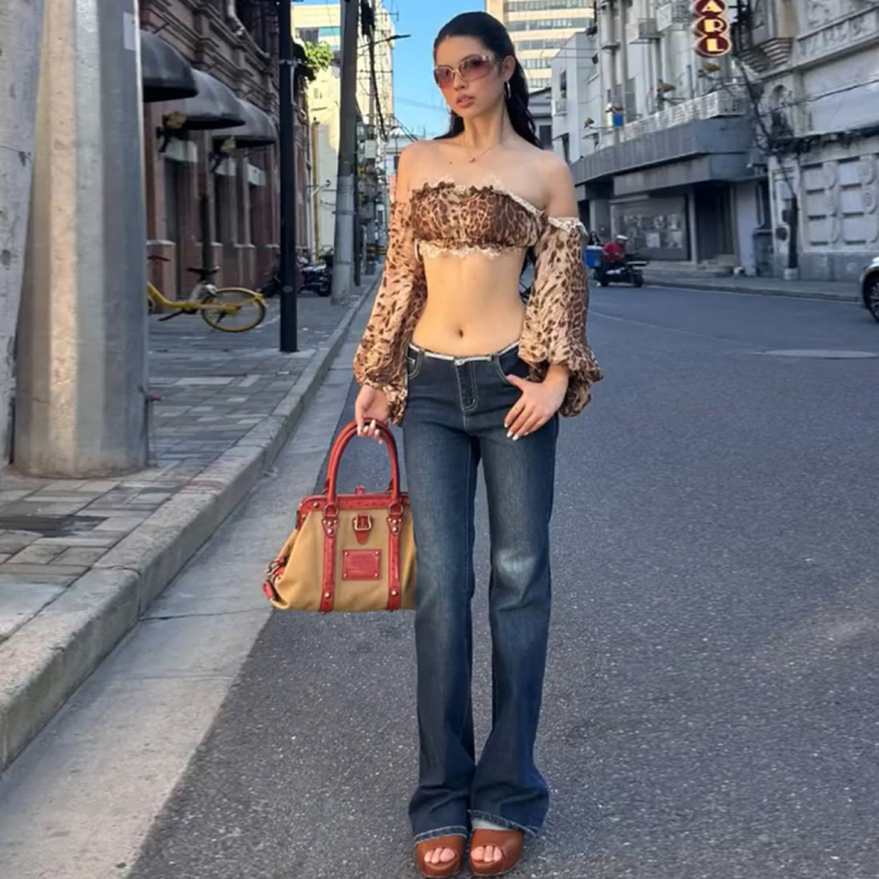 Leopard uzorak bez naramenica, uskog kroja, kratka duljina 40–50 cm, poliester s elastanom