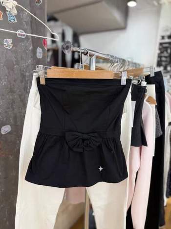 Top bez rukava s mašnicom, uski kroj, duljina 50-65 cm, pamuk mešavina 50-70%, mikroelastičan, naramenice nisu odvojive