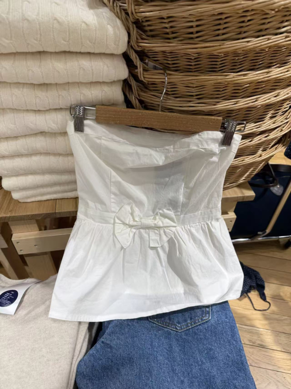 Top bez rukava s mašnicom, uski kroj, duljina 50-65 cm, pamuk mešavina 50-70%, mikroelastičan, naramenice nisu odvojive