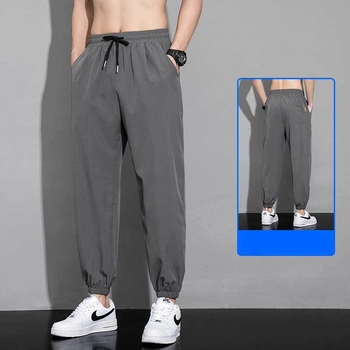 Férfi nyári gyorsan száradó sportnadrág, öves derék, egyenes szabás, kilencpontos hossz, poliészter