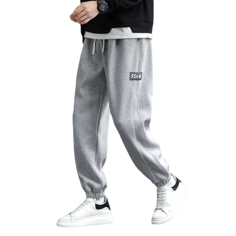 Férfi sportos, lazán szabott nadrág, húzózsinóros derékkal, teljes hosszúságú, 95% poliészter, egyszínű