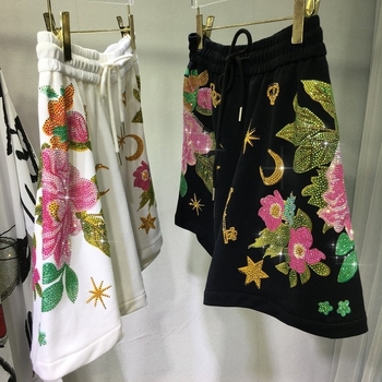 Pamučne hlače s visokim strukom, široki kroj, elastičan pojas, gradski hipster stil