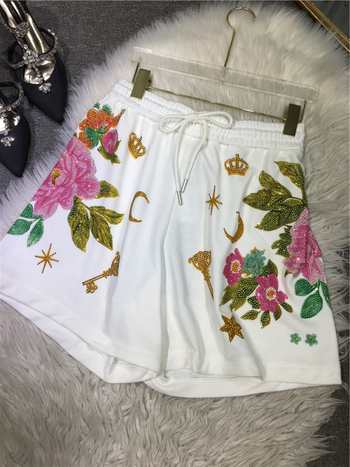 Pamučne hlače s visokim strukom, široki kroj, elastičan pojas, gradski hipster stil