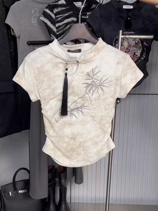 Pamut rövid ujjú póló kerek nyakú, növény- és virágmintás