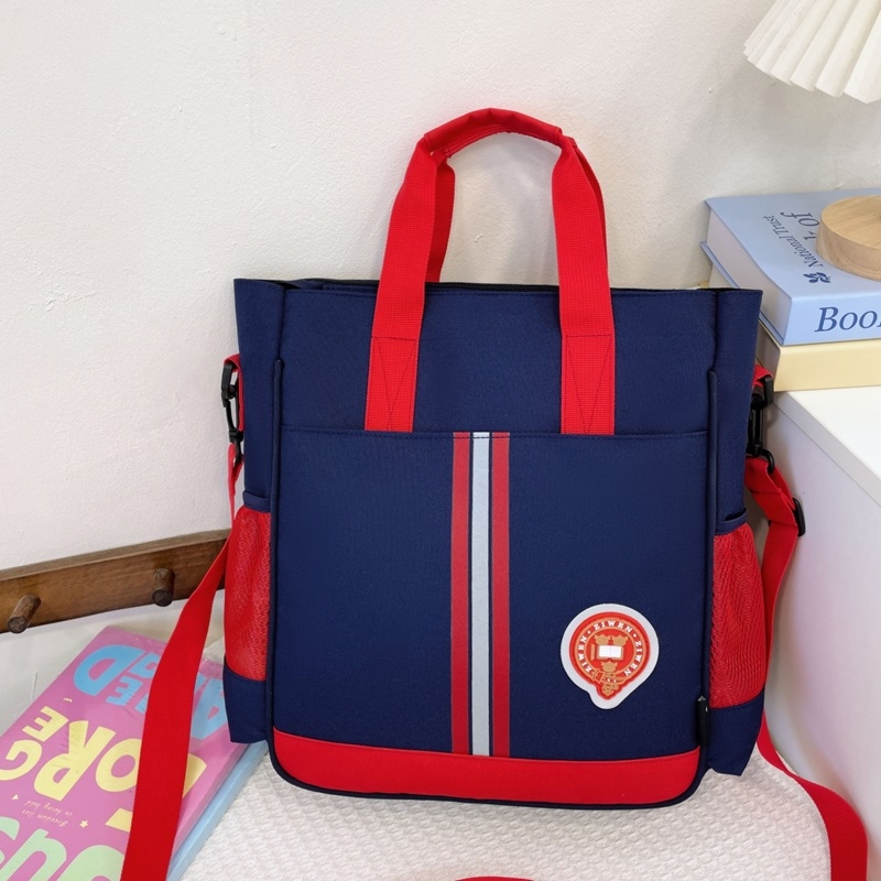 Torba za dopunske časove učenika osnovne škole – velik kapacitet, lagana, Oxford platno, otporna na habanje s proširenjem, svestrano nošenje preko ramena ili u ruci