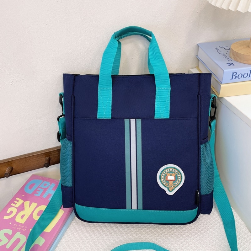 Torba za dopunske časove učenika osnovne škole – velik kapacitet, lagana, Oxford platno, otporna na habanje s proširenjem, svestrano nošenje preko ramena ili u ruci