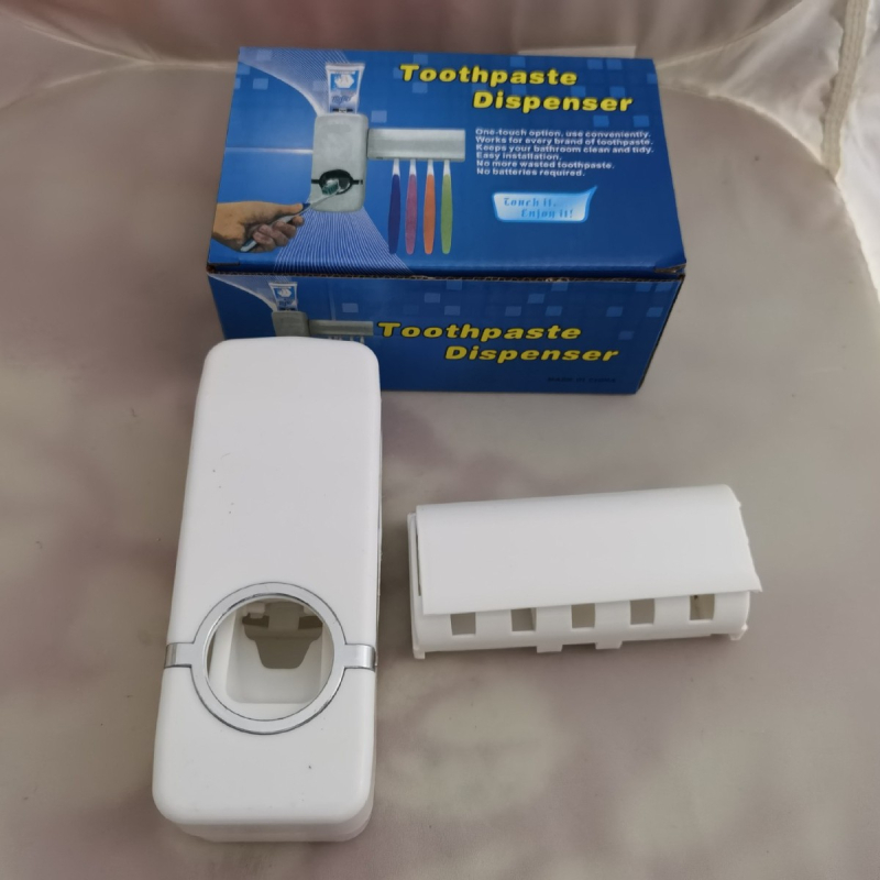 Automat pentru pastă de dinți cu montaj pe perete prin ventuză și suport pentru periuțe protejat de praf; potrivit pentru toate grupele de vârstă; neimportat.