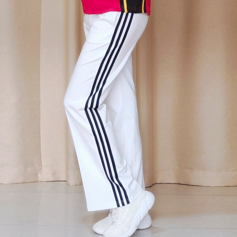 Női magas derekú, enyhén szélesedő sportnadrág három csíkkal, viszkóz szálas anyagból