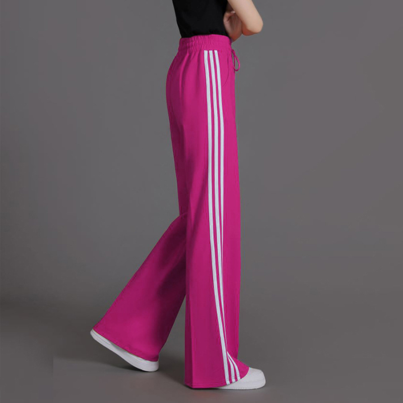 Női magas derekú, enyhén szélesedő sportnadrág három csíkkal, viszkóz szálas anyagból