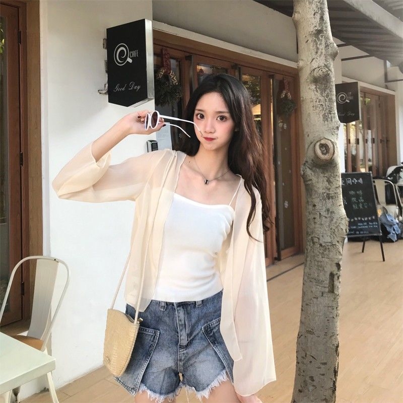 Cămașă cu imprimeu leopard în stil cerneală, poliester 90–95%, guler POLO, croială lejeră, nasturi pe un singur rând, Primăvara 2024