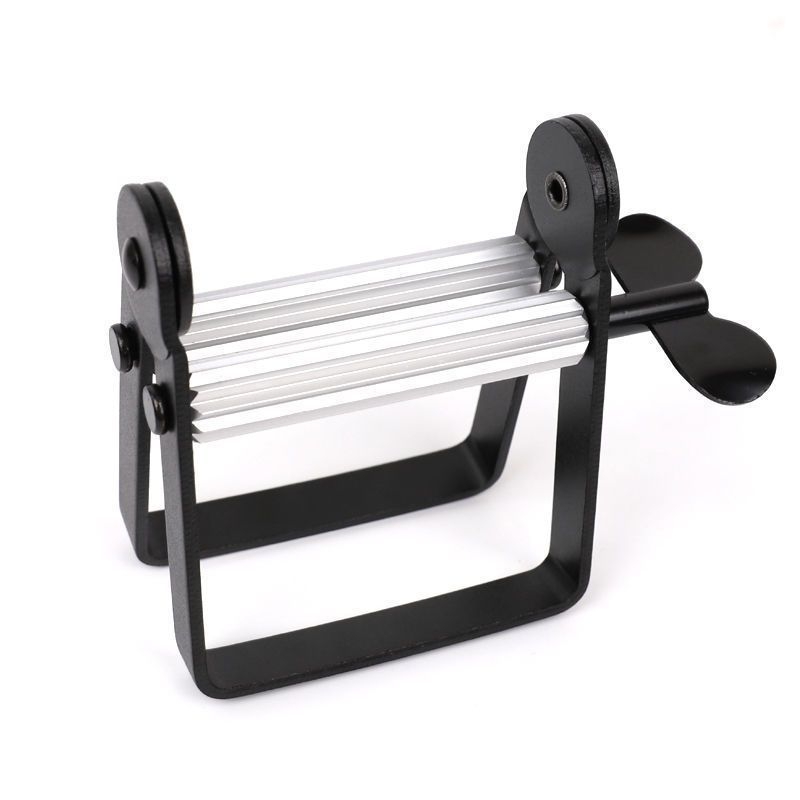 Kézi, fém fogkrémnyomó eszköz, rozsdamentes acélból, klip-stílusú pasztanyomó (Anyag: rozsdamentes acél; Működés: kézi; Alkalmazás: fogkrém és hajfesték paszták)