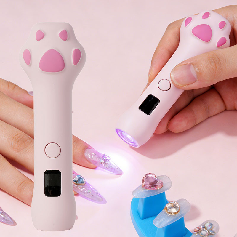 Kézben tartható manikűr lámpa Cat claw one-word lamp – Modell: Cat claw one-word lamp; Márka típusa: OEM; Csomagolás: ajándék doboz; Alkalmas: átlagos felhasználók