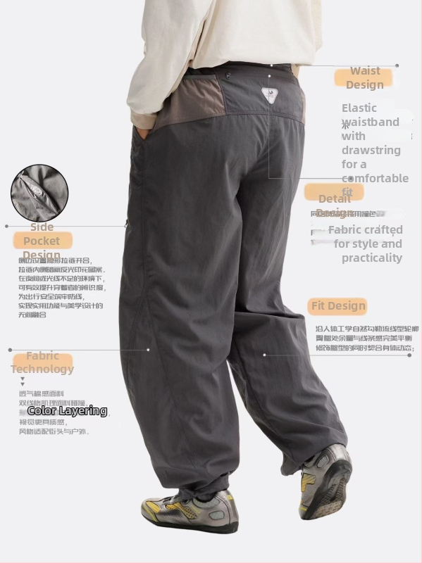 Pantaloni casual sport, 100% nylon, căptușiți cu fleece, talie medie cu curea și șnur, buzunare multiple