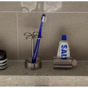 Nehrđajući čelični stisak za pastu za zube i držač na ploču za pastu i sredstvo za čišćenje lica