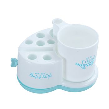 Fogkefetartó beépített pastadózóval és szájöblítő pohárral