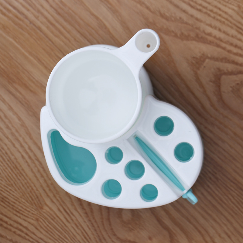 Fogkefetartó beépített pastadózóval és szájöblítő pohárral