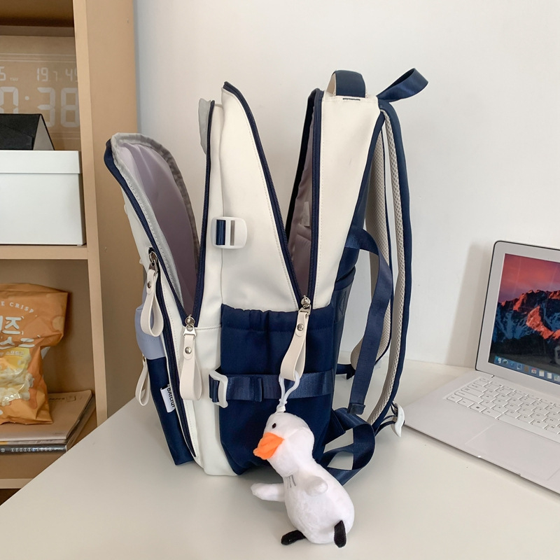 Unisex ruksak od najlona, prozračan, vodootporan i ultralak, naramenice s zračnim jastučićima za školu