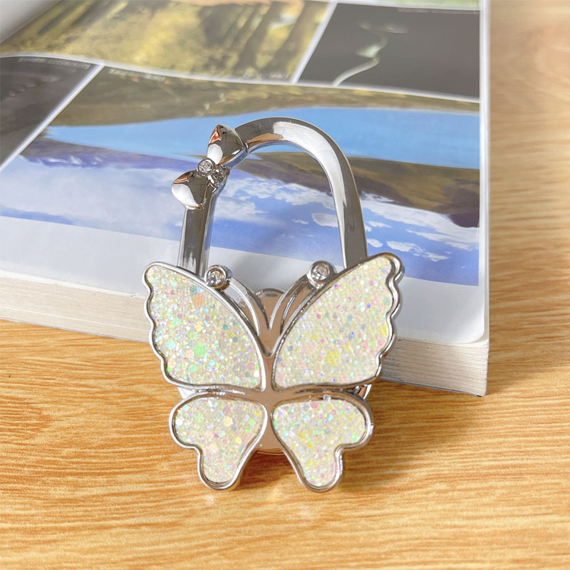 Αναδιπλούμενος γάντζος, κράμα ψευδάργύρου, μονός γάντζος, μοντέρνος μινιμαλιστικός σχεδιασμός, μέγιστο φορτίο 3–5 κιλά.