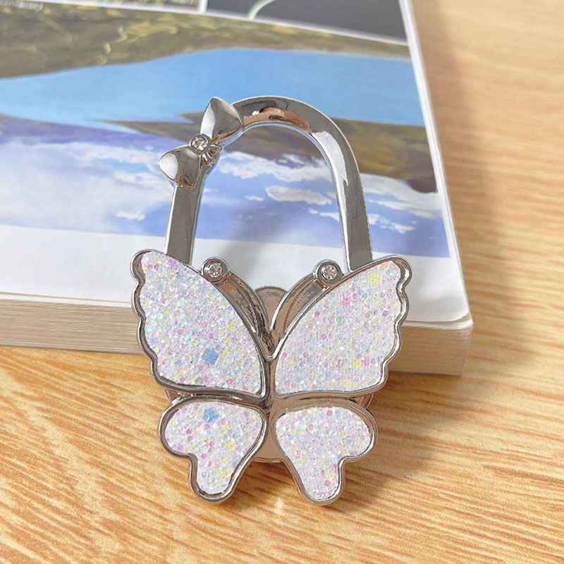 Αναδιπλούμενος γάντζος, κράμα ψευδάργύρου, μονός γάντζος, μοντέρνος μινιμαλιστικός σχεδιασμός, μέγιστο φορτίο 3–5 κιλά.