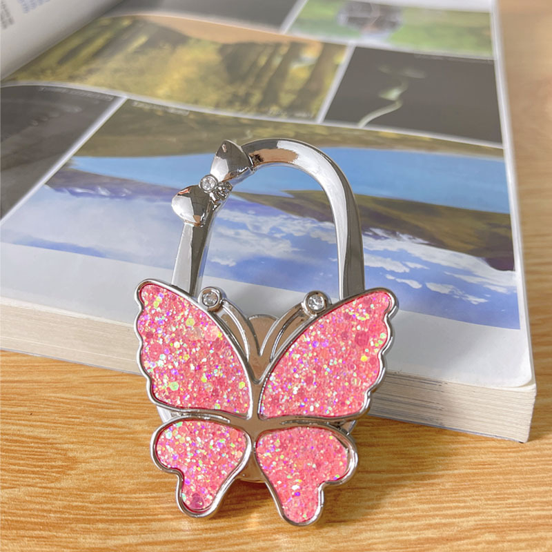 Αναδιπλούμενος γάντζος, κράμα ψευδάργύρου, μονός γάντζος, μοντέρνος μινιμαλιστικός σχεδιασμός, μέγιστο φορτίο 3–5 κιλά.