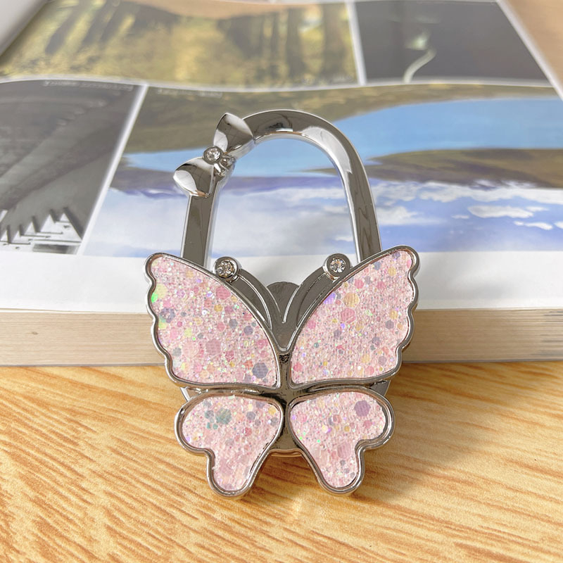 Αναδιπλούμενος γάντζος, κράμα ψευδάργύρου, μονός γάντζος, μοντέρνος μινιμαλιστικός σχεδιασμός, μέγιστο φορτίο 3–5 κιλά.