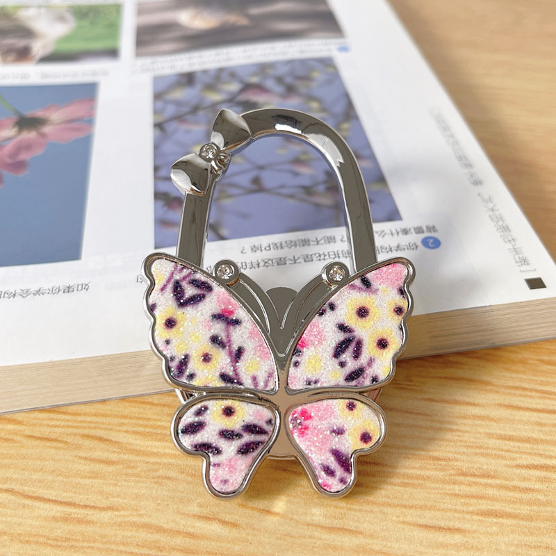 Αναδιπλούμενος γάντζος, κράμα ψευδάργύρου, μονός γάντζος, μοντέρνος μινιμαλιστικός σχεδιασμός, μέγιστο φορτίο 3–5 κιλά.