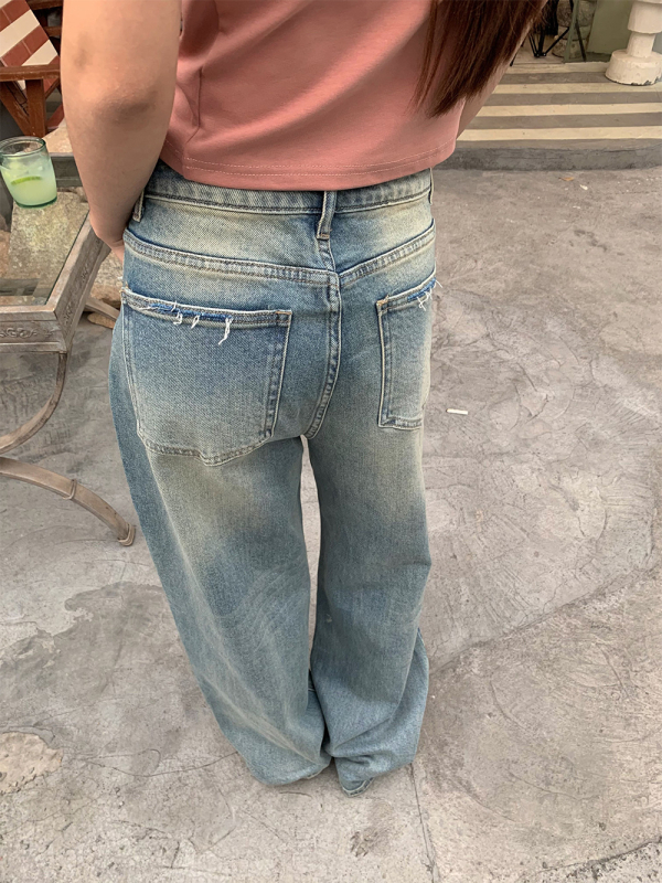 Ženske traperice od denima, visoki struk, široke nogavice, poderani detalji i patchwork, proljeće 2025